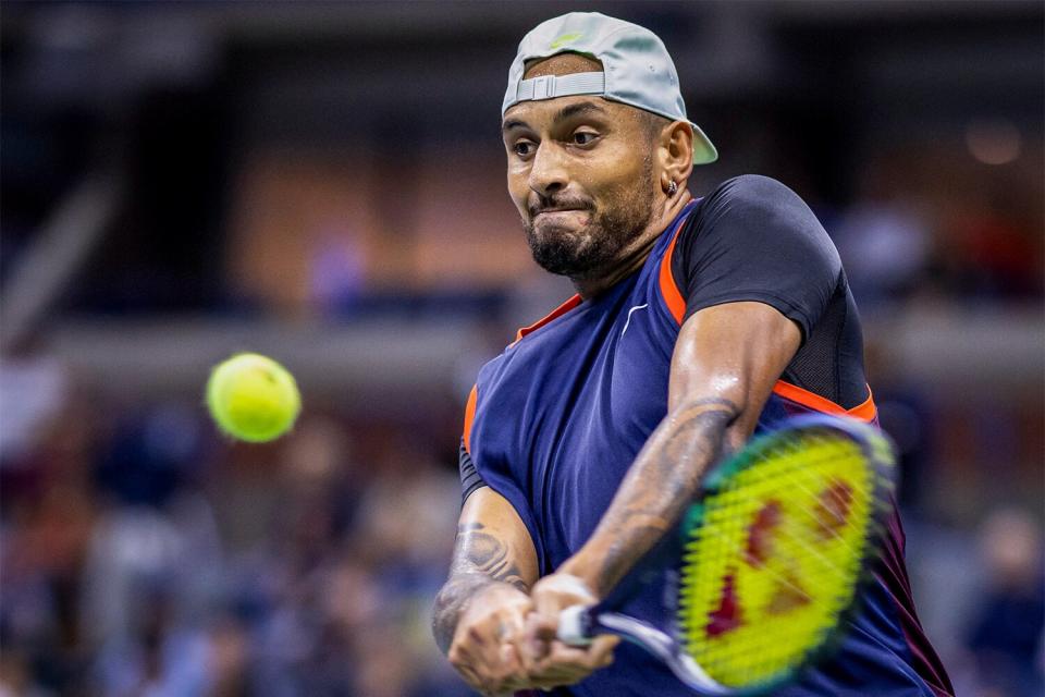 Australia's Nick Kyrgios hits a return to Russia's Karen Khachanov during their 2022 US Open Tennis tournament men's singles quarter-final match at the USTA Billie Jean King National Tennis Center in New York on September 6, 2022.