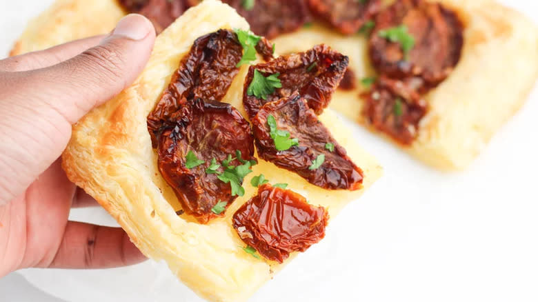 Puff pastry square with sun-dried tomatoes