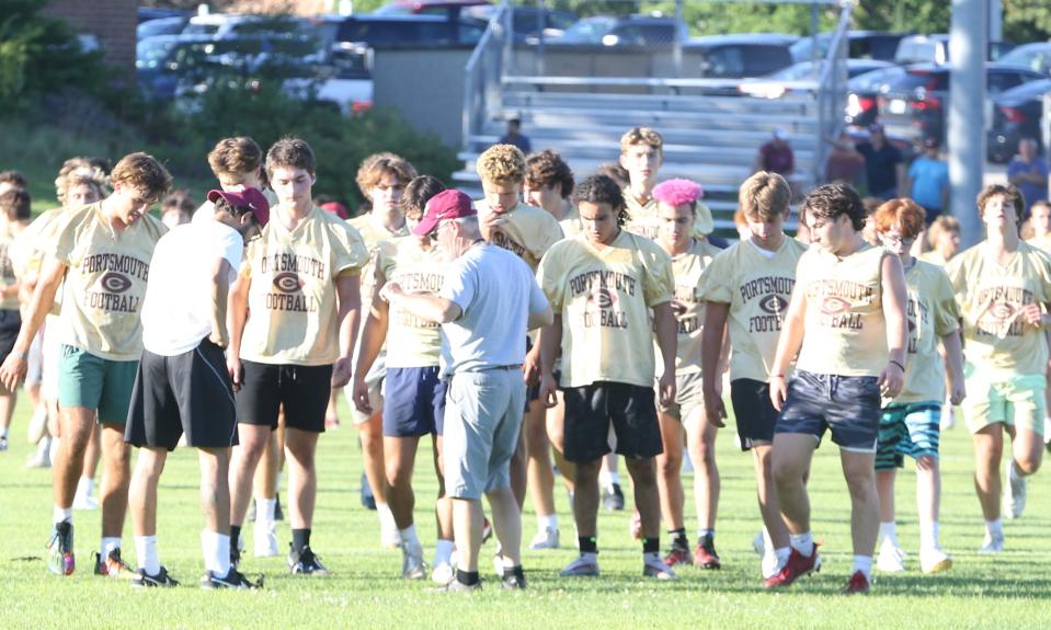 Portsmouth/Oyster River football head coach Brian Pafford addresses some of the 115 players who attended the first day of practice for the 2023 season Friday, Aug. 11.