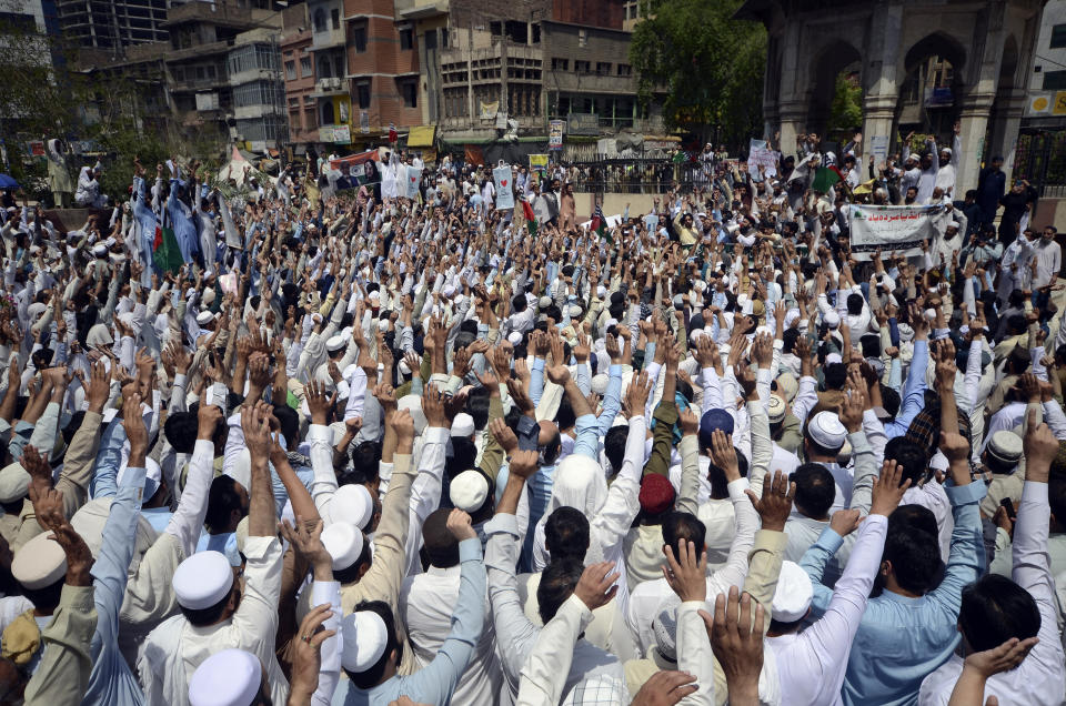 Pakistani traders demonstrate to condemn derogatory references to Islam and the Prophet Muhammad recently made by Nupur Sharma, a spokesperson of the governing Indian Hindu nationalist party, Friday, June 10, 2022, in Peshawar, Pakistan. (AP Photo/Mohammad Sajjad)