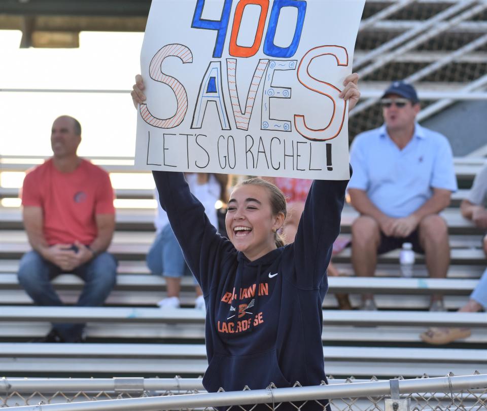 Benjamin fans, including Rachel Haueisen's sister, celebrated the goalkeeper hitting a 400-save milestone during the Bucs' win over Jupiter on Mar. 14, 2024.