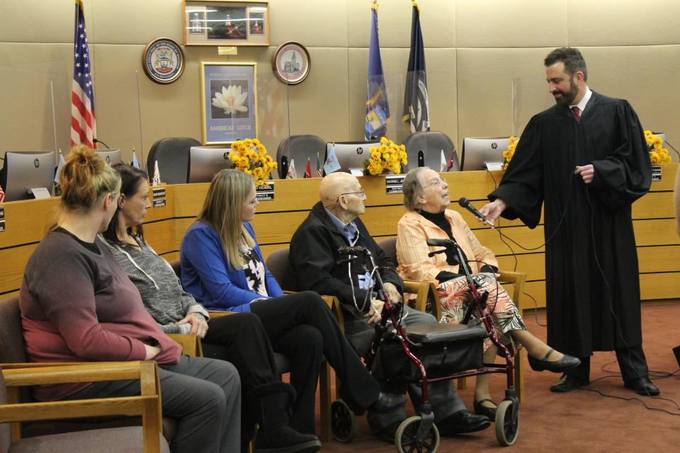 On Monroe County Adoption Day 2022, Monroe County Probate Judge Frank L. Arnold, right, asked Donna and Donald Sammons to share their story.  Judge Arnold presided over the adoption of Cynthia Skaggs, left, Angela Sammons and Samantha Cousino to their grandparents.