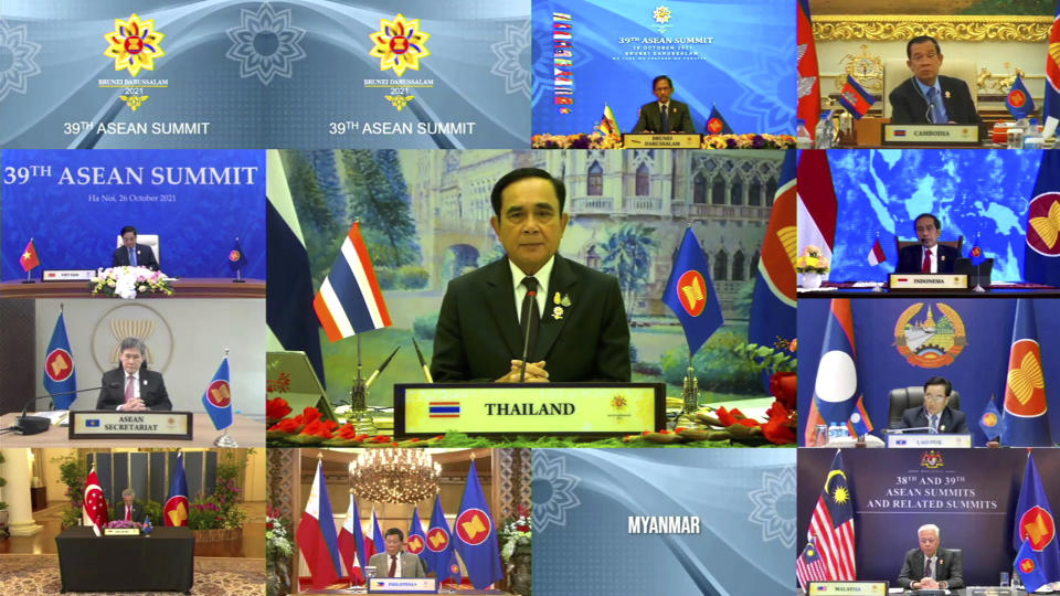 In this image released on Tuesday, Oct. 26, 2021, by Brunei ASEAN Summit in Bandar Seri Begawan, Thailand's Prime Minister Prayuth Chan-ocha, center, speaks during a virtual summit with the leaders of the Association of Southeast Asian Nations (ASEAN) member​ states. Southeast Asian leaders began their annual summit without Myanmar on Tuesday amid a diplomatic standoff over the exclusion of the leader of the military-ruled nation from the group's meetings. An empty box of Myanmar is seen at bottom second from right. (Brunei ASEAN Summit via AP)