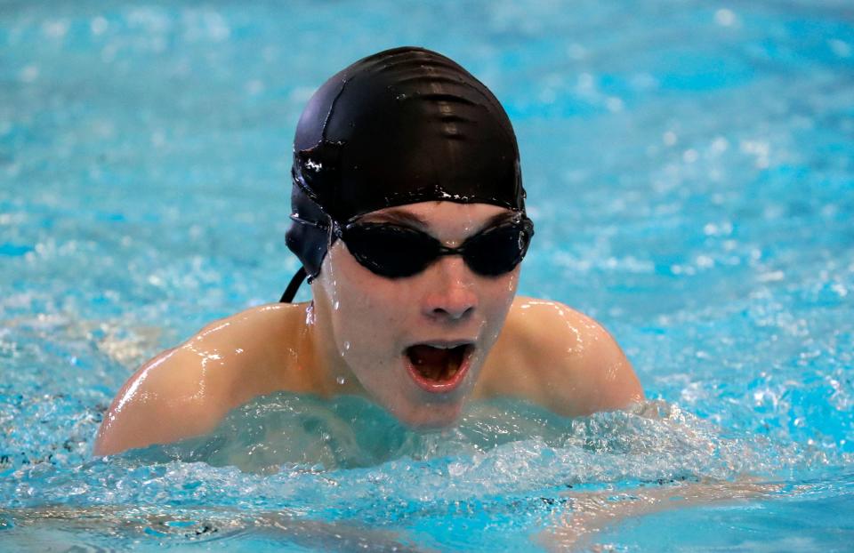 Manitowoc’s Alexander Haas swims the 200-yard IM at the Plymouth Invitational on Saturday in Plymouth.