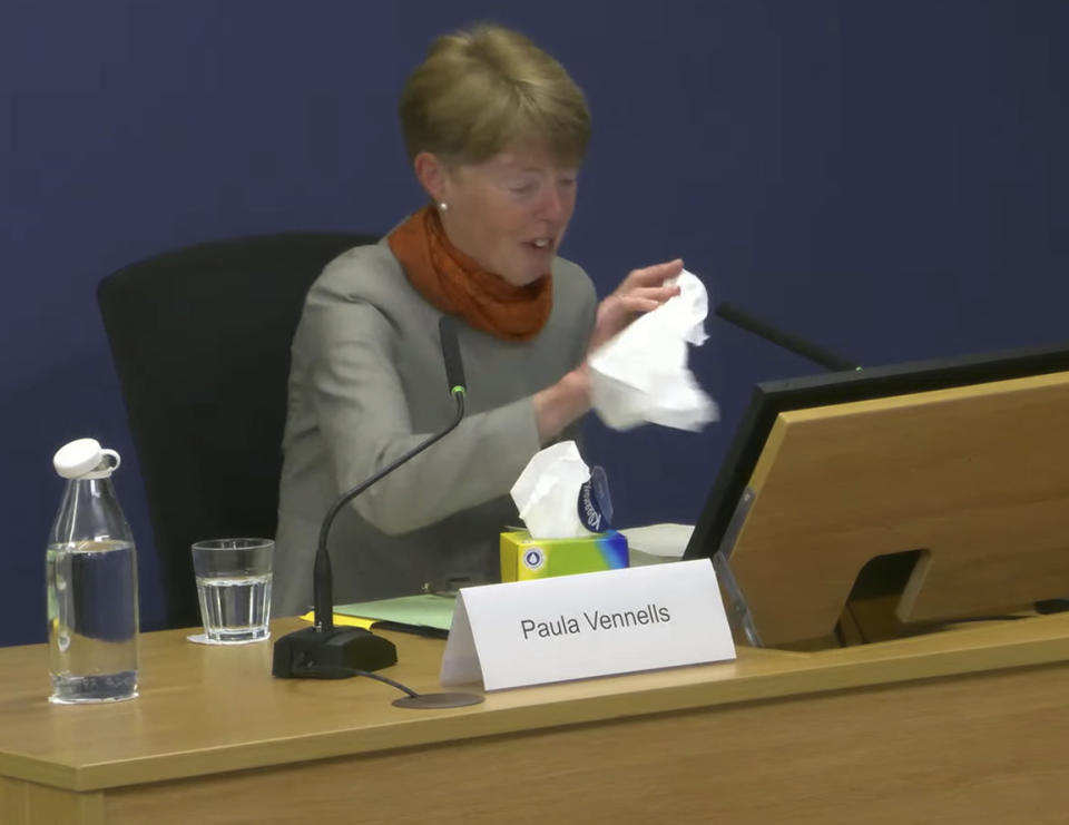 Screen grab taken from the Post Office Horizon IT Inquiry of former Post Office boss Paula Vennells becoming tearful for a second time whilst giving evidence to the inquiry at Aldwych House, as part of phases five and six of the probe, which is looking at governance, redress and how the Post Office and others responded to the scandal, in central London on Wednesday May 22, 2024. (Post Office Horizon IT Inquiry/PA via AP)