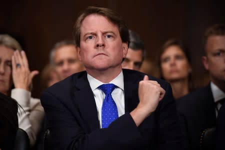 White House Counsel Don McGahn listens to Supreme Court nominee Brett Kavanaugh as he testifies before the US Senate Judiciary Committee on Capitol Hill in Washington