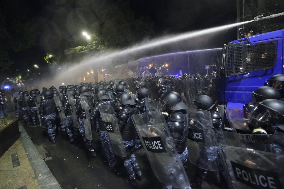 Riot police use a water cannon during an opposition protest against "the Russian law" near the Parliament building in Tbilisi, Georgia, on Tuesday, April 30, 2024. (AP Photo/Zurab Tsertsvadze)