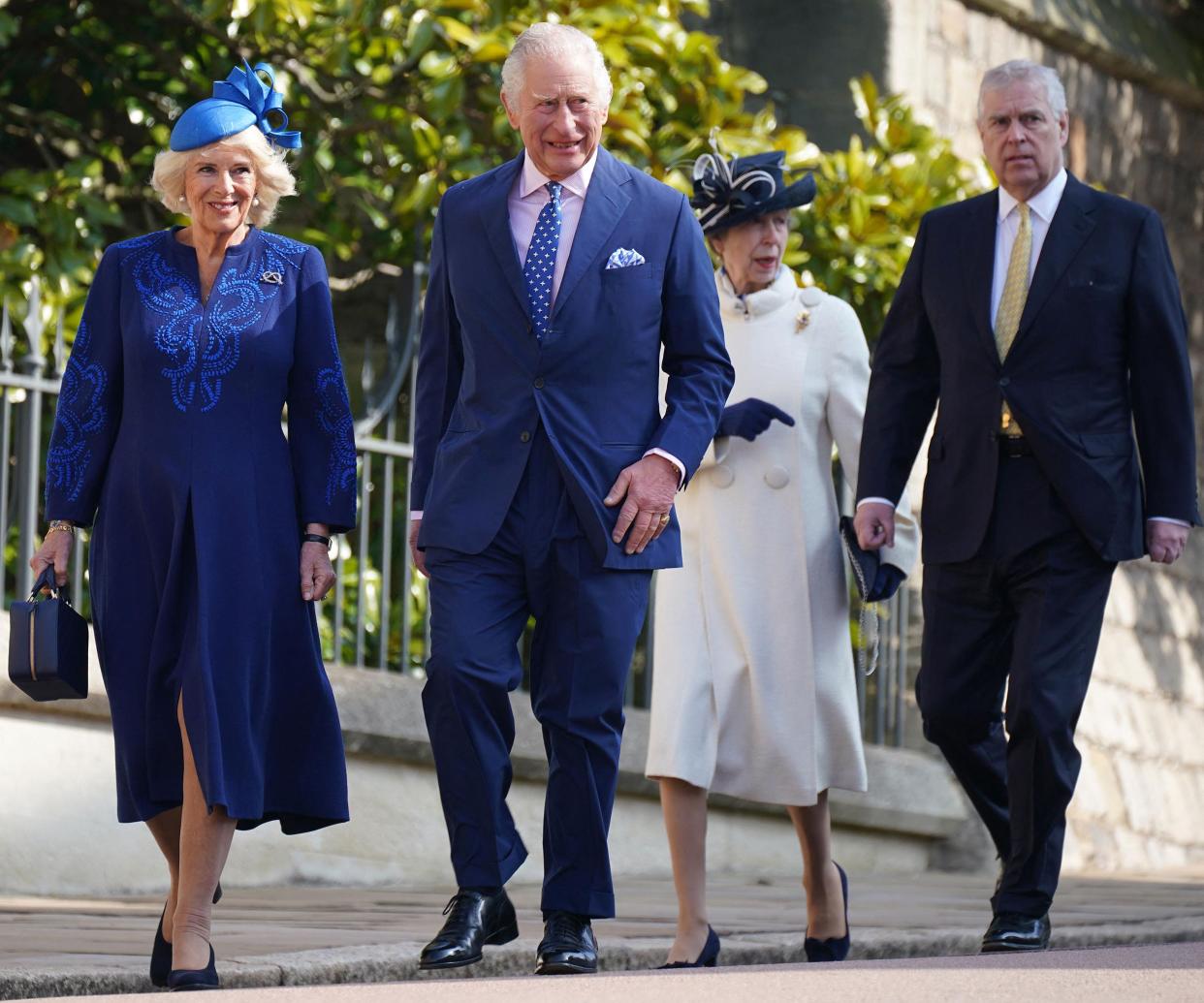 Britain's King Charles III and Camilla, queen consort, walk with Princess Anne and Prince Andrew, duke of York as they arrive for the Easter service at St. George's Chapel, Windsor Castle on April 9.