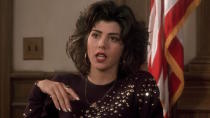 <p> Fashionable <em>and </em>passionate, Marisa Tomei is a pistol of a woman in Jonathan Lynn’s enduring 1992 comedy My Cousin Vinny. While on paper she’s only the fiance of Joe Peschi’s Vinny Gambini, Mona Lisa Vito soars above everyone else to become the movie’s real show-stopper, a feisty second generation Italian-American woman who proudly contrasts with the movie’s primary rural Alabaman settings. Tomei rightfully won an Oscar for her performance, portraying a fully realized individual who is more than surface-level stereotypes of east coast Italians. </p>