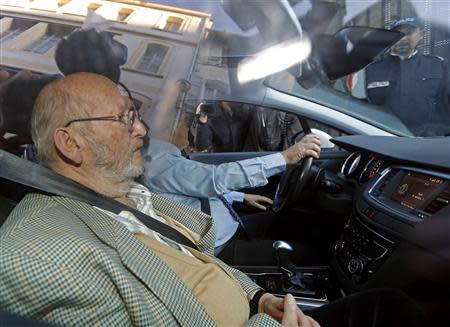 Jean-Claude Mas (L), founder of French company Poly Implant Prothese (PIP), arrives with his lawyer Yves Haddad at the Marseille's court December 10, 2013. REUTERS/Jean-Paul Pelissier