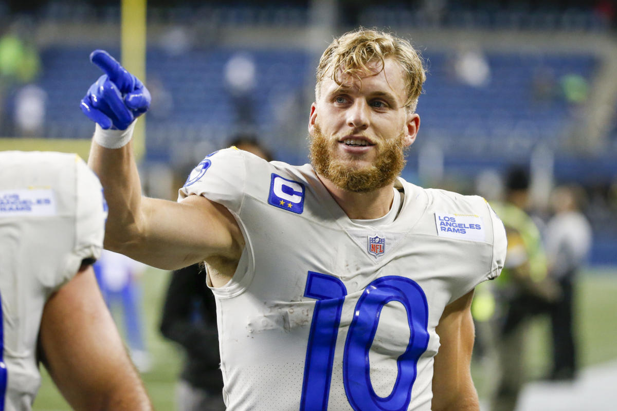 Cooper Kupp signed his extension wearing a Matthew Stafford jersey