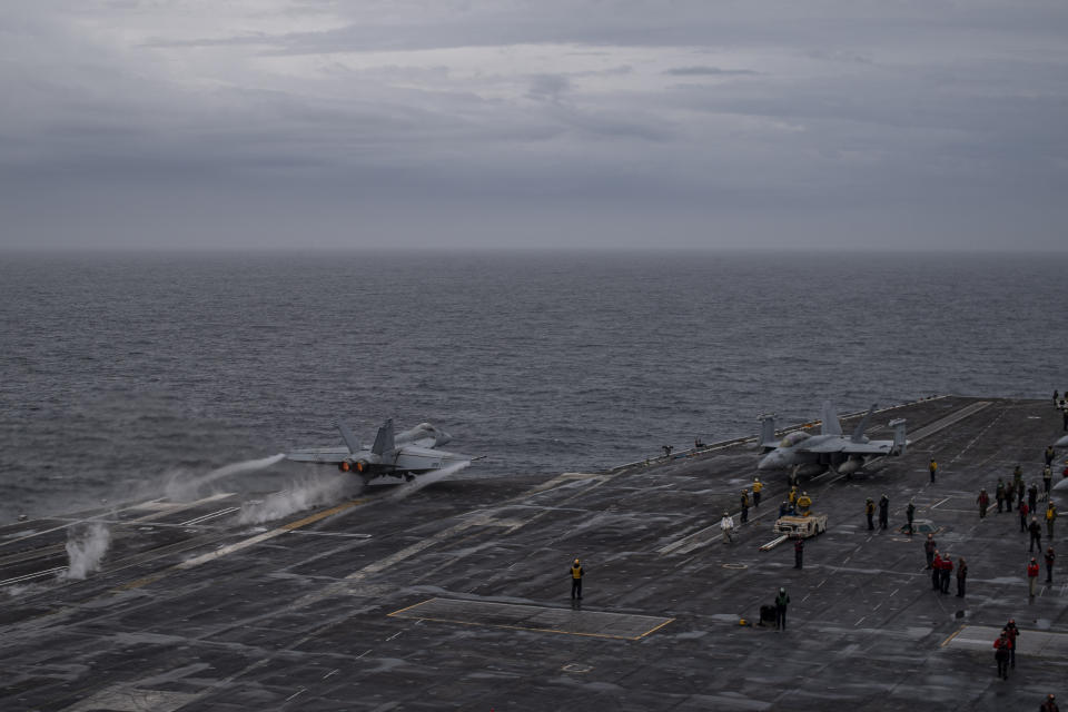 In this photo provided by the U.S. Navy, a U.S. fighter jet takes off from USS Theodore Roosevelt aircraft carrier during the Freedom Edge exercise by the U.S., Japanese and South Korea at East Sea on Friday, June 28, 2024. (Mass Communication Specialist 2nd Class Aaron Haro Gonzalez/The U.S. Navy via AP)