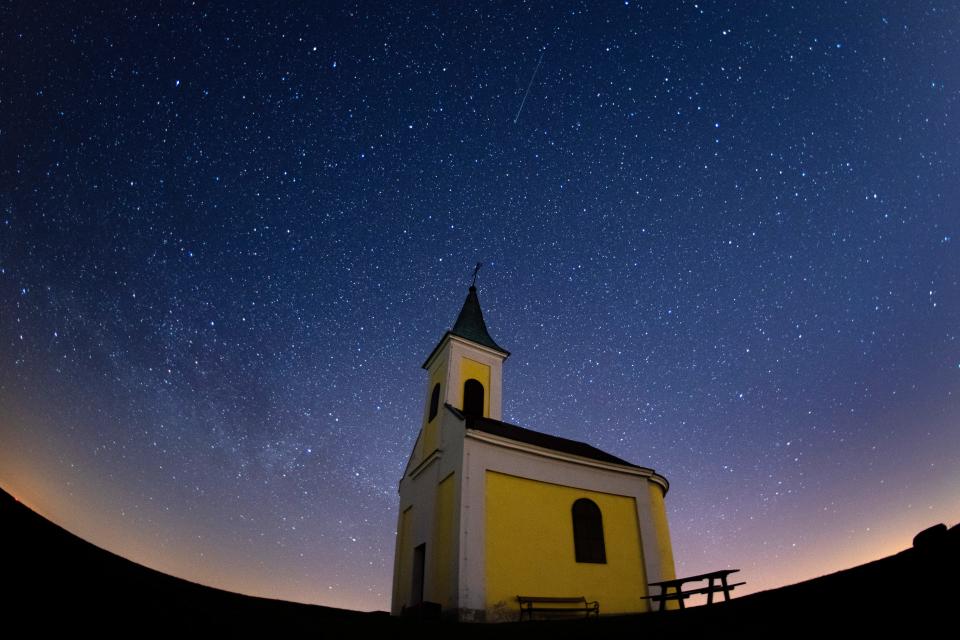 NIEDERHOLLABRUNN, AUSTRIA - APRIL 21: The Lyrids meteor shower streaks across the sky on April 21, 2020 over Austria in Niederhollabrunn, Austria. The annual display is caused by the Earth passing through a cloud of debris from a comet called C/186 Thatcher.