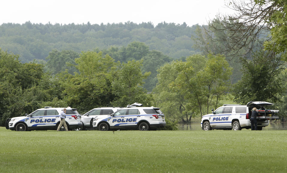 The Madison Fire Department's lake rescue team found the body of a man that was swept away by flood waters Monday evening, at Greentree Park in Madison, Wis., Tuesday, Aug. 21, 2018. (Amber Arnold/Wisconsin State Journal via AP)