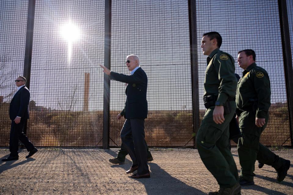 President Joe Biden walks along the US-Mexico border fence in El Paso, Texas, on January 8, 2023. President Biden will visit the US-Mexico border in Texas on February 29, 2024, the White House announced, in the Democrat's latest bid to regain control over soaring illegal immigration ahead of November's elections.