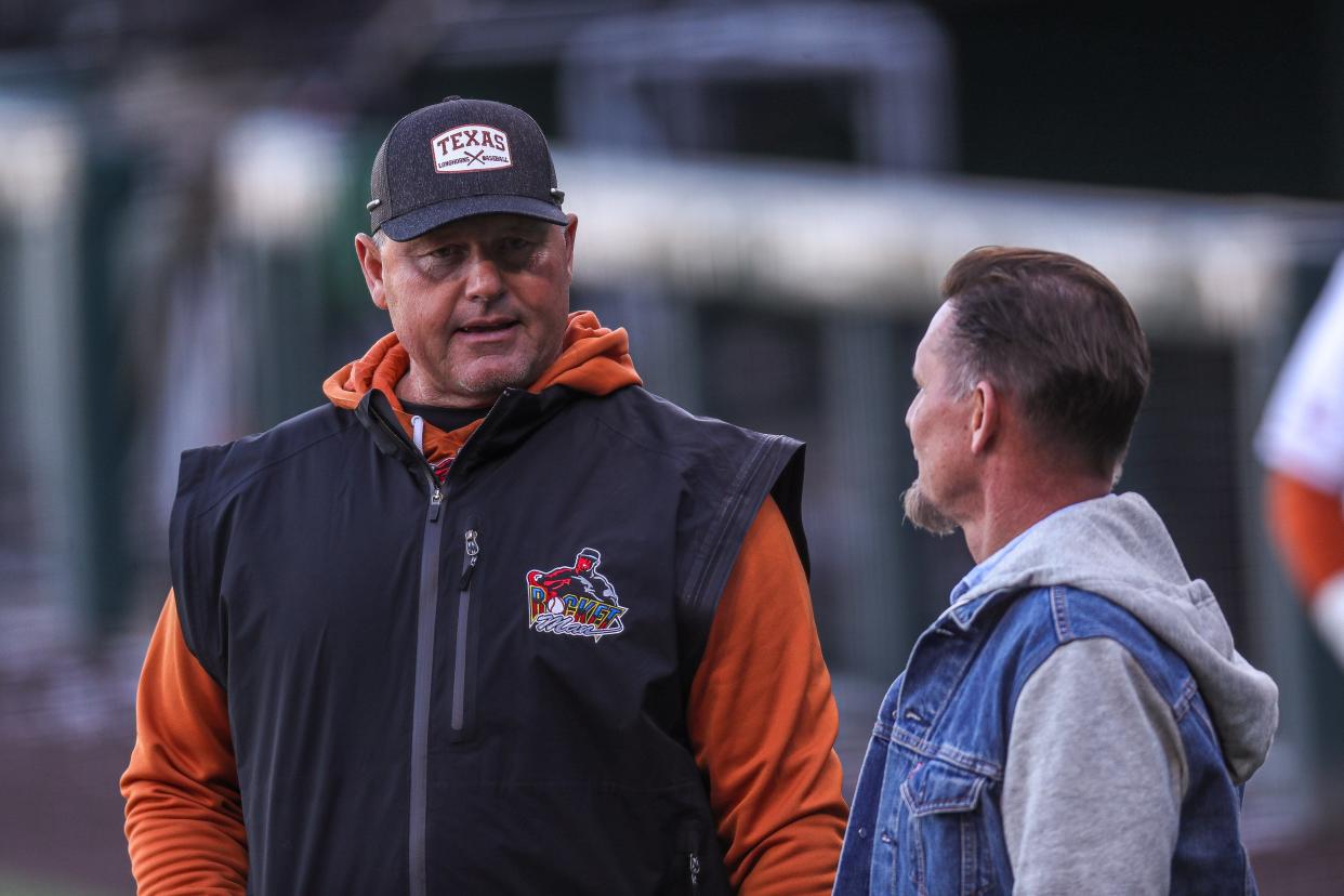 Former Texas baseball player Roger Clemens, left, talks to former Longhorns shortstop Mike Brumley before the 2022 Texas Alumni Game at UFCU Disch-Falk Field. They were teammates on Texas' 1983 national championship team.