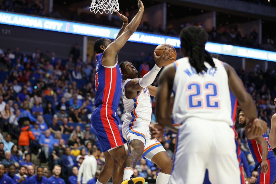 Oct 19, 2023; Tulsa, Oklahoma, USA; Oklahoma City Thunder forward Jalen Williams (8) shoots around Detroit Pistons guard <a class="link " href="https://sports.yahoo.com/nba/players/4893" data-i13n="sec:content-canvas;subsec:anchor_text;elm:context_link" data-ylk="slk:Alec Burks;sec:content-canvas;subsec:anchor_text;elm:context_link;itc:0">Alec Burks</a> (14) during the third quarter at BOK Center. Mandatory Credit: Joey Johnson-USA TODAY Sports