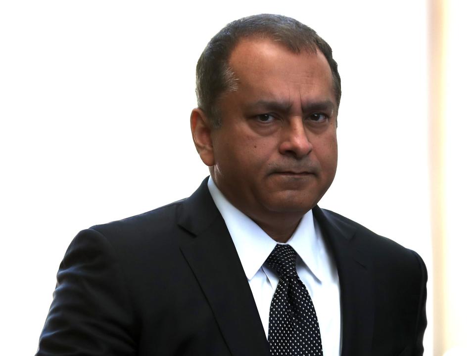 Former Theranos COO Ramesh Balwani (L) arrives at the Robert F. Peckham U.S. Federal Court on April 22, 2019 in San Jose, California. Former Theranos CEO Elizabeth Holmes and former COO Ramesh Balwani appeared in federal court for a status hearing. Both are facing charges of conspiracy and wire fraud for allegedly engaging in a multimillion-dollar scheme to defraud investors with the Theranos blood testing lab services.