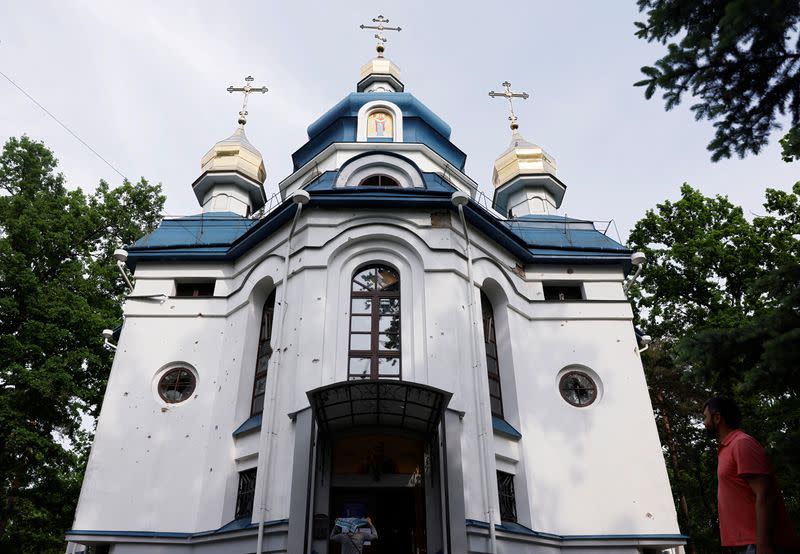 A view of Saint Nicholas church, pockmarked with shrapnel and bullet holes, as Russia's attack on Ukraine continues, in Irpin