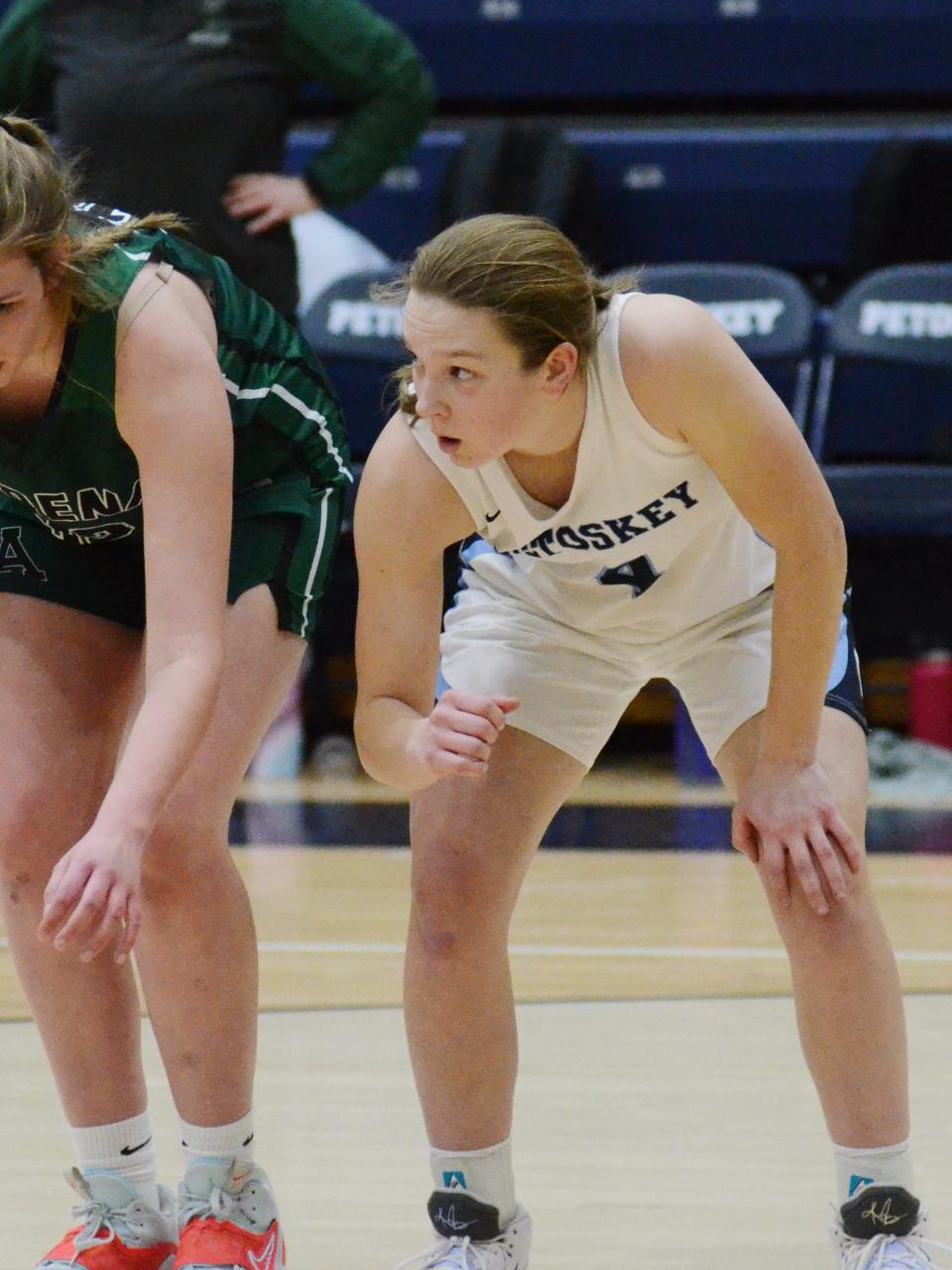 Petoskey's Kenzie Bromley gets ready to box out an Alpena player on a free throw attempt Friday night.