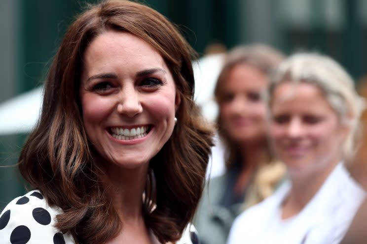 The Duchess of Cambridge was all smiles on the first day of Wimbledon [Photo: PA]