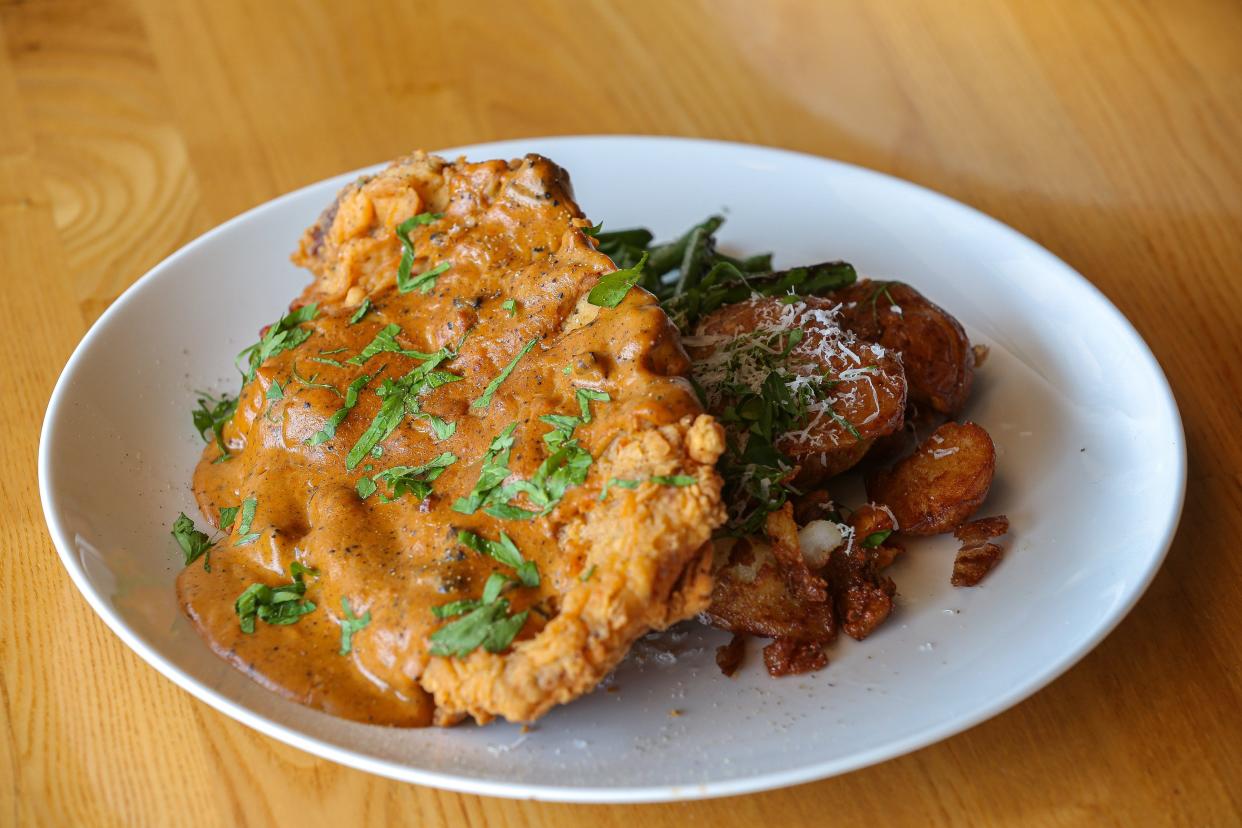 Several readers nominated chicken fried steak for best Texas dish. Pictured here is the one Statesman restaurant critic Matthew Odam says is one of the best he's had in Texas, at Commerce Cafe in Lockhart.