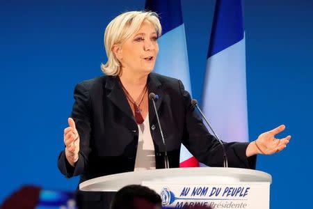 Marine Le Pen, French National Front (FN) political party leader and candidate for French 2017 presidential election, delivers a speech after early results in the first round of 2017 French presidential election, in Henin-Beaumont, France, April 23, 2017. REUTERS/Charles Platiau