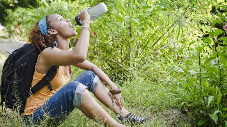 Hiker drinking water