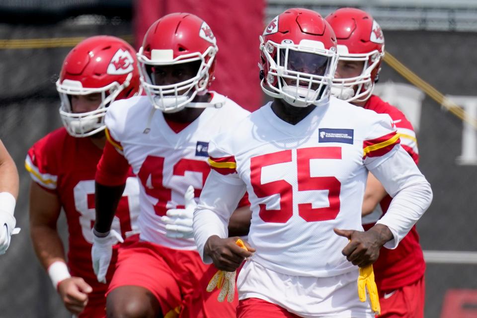 Kansas City Chiefs defensive end Frank Clark (55) runs during the NFL football team's minicamp Wednesday, June 16, 2021, in Kansas City, Mo.