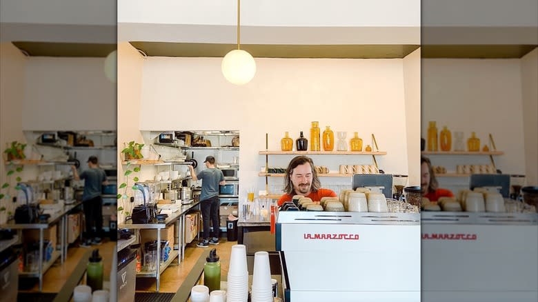 Barista making coffee at Ruby Coffee Roasters