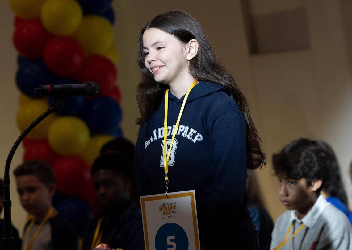 Barbara Briceno, a student from BridgePrep Academy, spells a word during the first round Miami Herald Miami-Dade/Monroe County Spelling Bee.