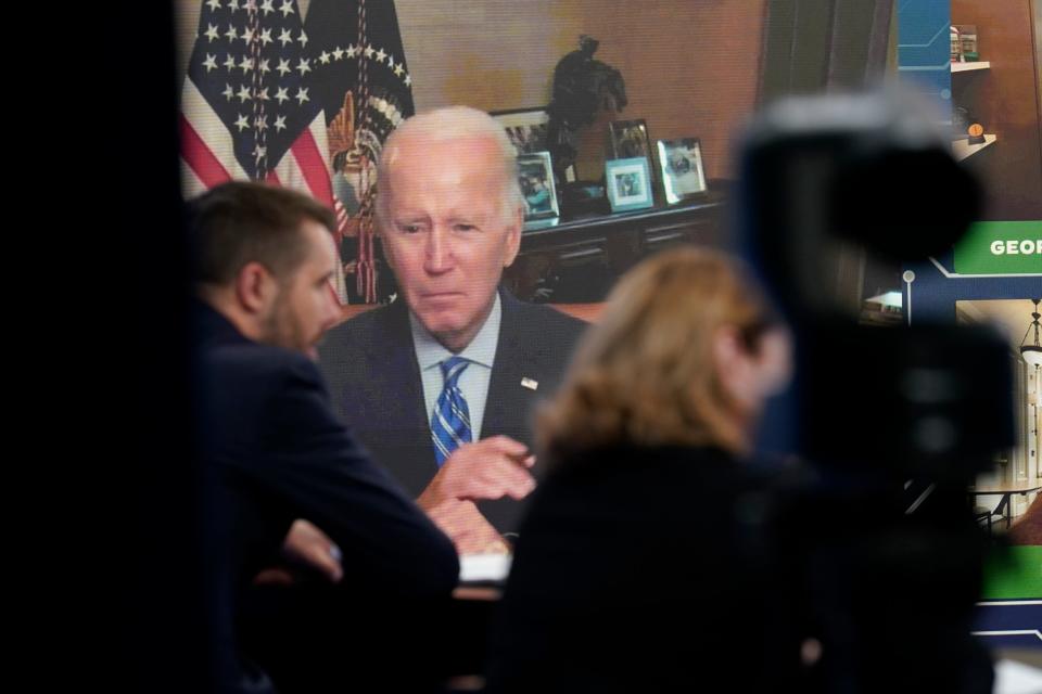Thee Biden administration announced updated guidance Wednesday that gives greater flexibility for local and state governments to address affordable housing with their share of $350 billion in direct aid from the American Rescue Plan. Here, Biden, who continues to recover from a COVID-19 infection, listens to aides Monday at a virtual event from the White House.