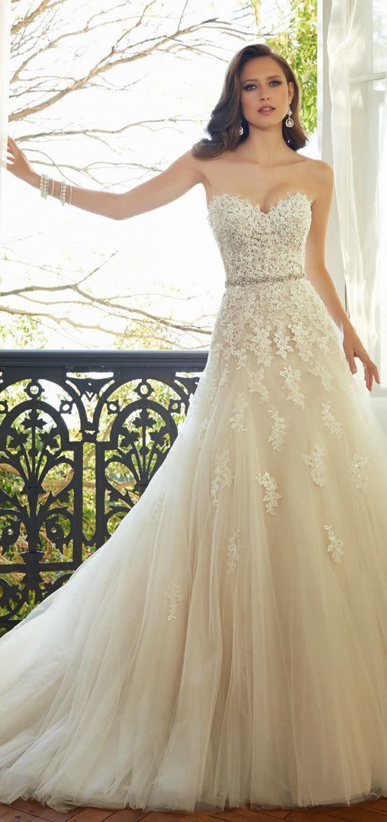 While the designer of this dress is unknown, the laced strapless bodice is serious inspo.