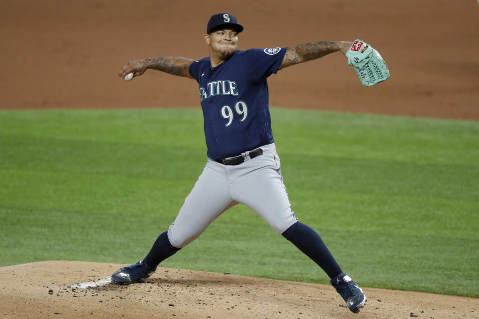 Seattle Mariners starting pitcher Taijuan Walker (99) throws to the Texas Rangers in the first inning of a baseball game in Arlington, Texas, Wednesday, Aug. 12, 2020. (AP Photo/Tony Gutierrez)