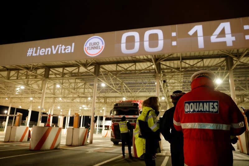 The first trucks leave Eurotunnel's new customs border in Calais following Britain's EU exit