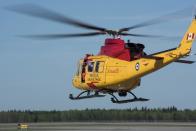 Members of 417 Combat Support Squadron prepare to depart for Fort McMurray as part of Operation LENTUS, 4 Wing Cold Lake, Alta., on Wednesday, May 4, 2016. THE CANADIAN PRESS/HO-DND, Cpl. Manuela Berger