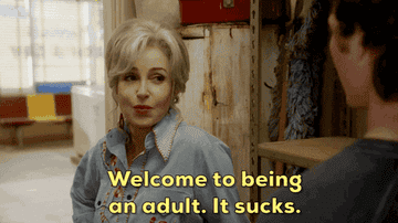 woman saying "Welcome to being an adult, it sucks"