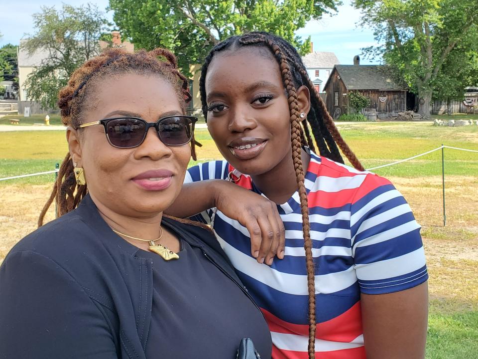 Precious Shilley, left, and her daughter, 17-year-old Mazai Bowah, became U.S. citizens during a naturalization ceremony at Strawbery Banke Museum in Portsmouth Monday, July 4, 2022.