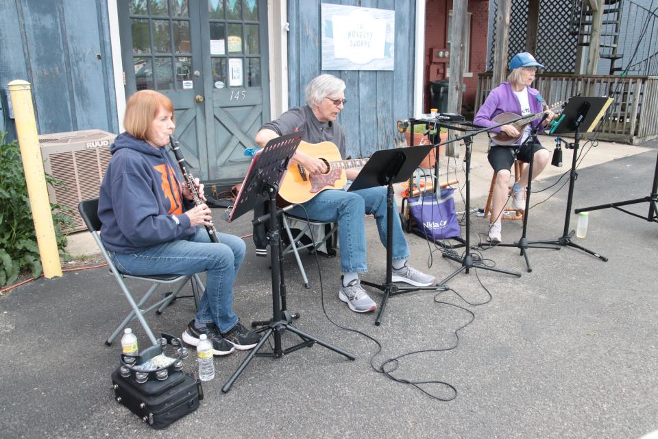 Gramberry Jam — from left, Ann Cebulski, Bill Sturk and Connie Aichele  — perform Tuesday during the 517 Party at Nova's Soda Pop Candy Shop in Adrian.