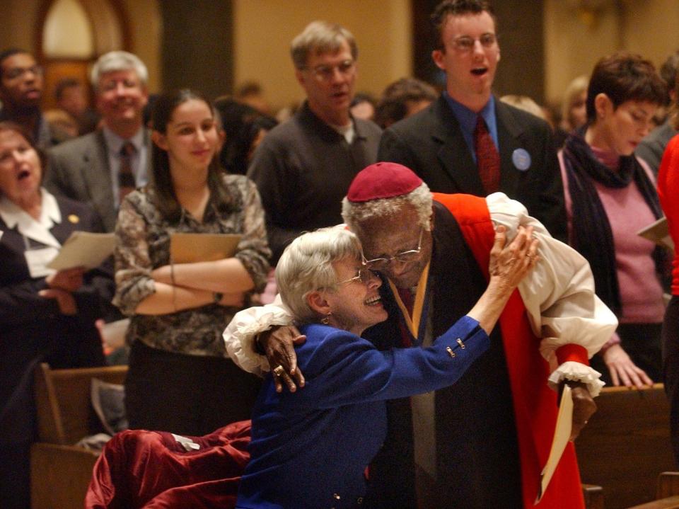 Feb 12. 2003 The Most Rev. Desmond Mpilo Tutu, Nobel Peace Laureate and Archbishop Emeritus, Cape Town, South Africa greeted Judy Mayotte, who taught at Marquette University and was also a board member of The Desmond Tutu Peace Foundation. He also greeted others in the crowd after speaking at Gesu Church in Milwaukee and being presented with The Pere Marquette Discovery Award from Marquette University.