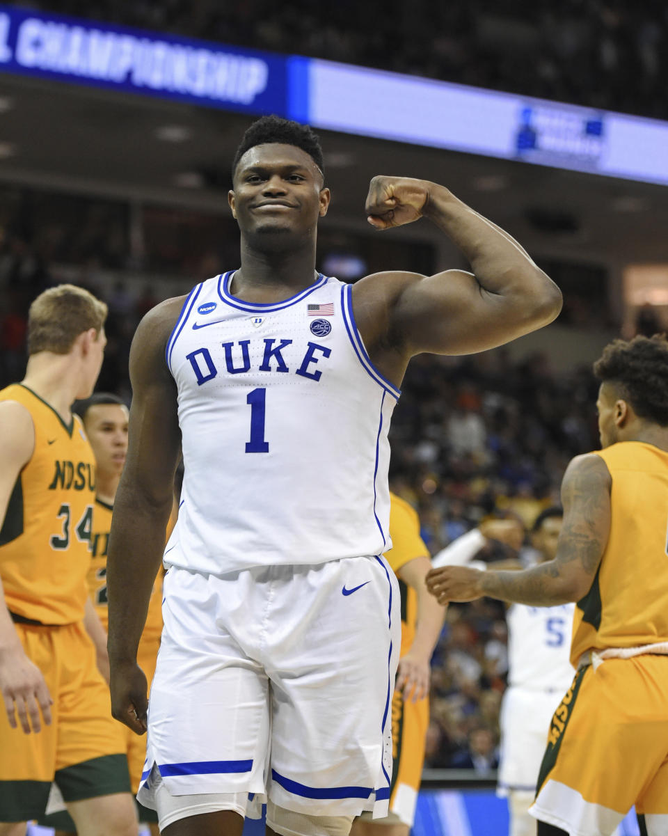 Duke's Zion Williamson (1) flexes after a basket against North Dakota State in a first-round game in the NCAA men’s college basketball tournament in Columbia, S.C., Friday, March 22, 2019. (AP Photo/Richard Shiro)