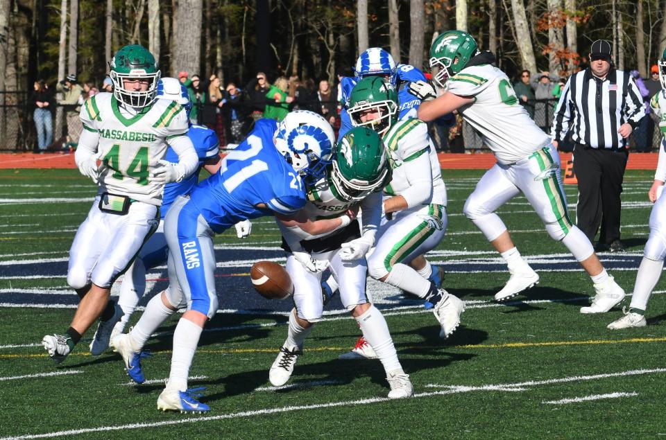 Kennebunk’s Moose Keys (21) breaks up a pass to Massabesic’s Cameron Bouchard on Saturday.