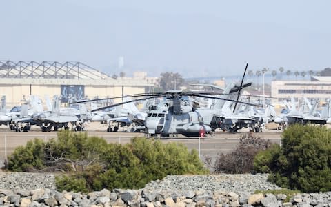 A United States Marine Corps CH-53E Super Stallion Helicopter like that which crashed in California, sits at North Island Naval Air Station Coronado - Credit:  Louis Nastro/Reuters