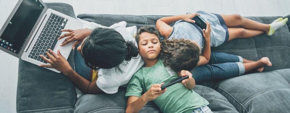 family using digital devices