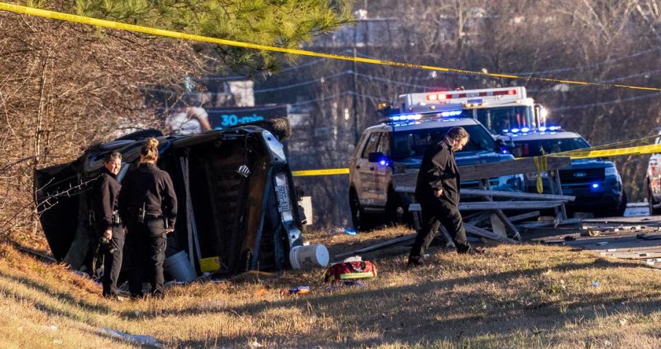 Raleigh police officers and firefighters work the scene of a crash on Interstate 440 between New Bern Avenue and Brentwood Road that “concerns an officer-involved shooting,” the Raleigh Police Department said Tuesday, Jan. 11, 2022.
