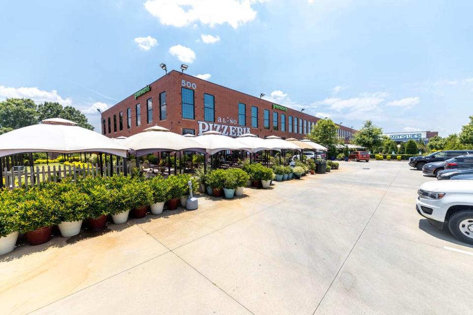 Once set to be razed, Merino Mill is now a vibrant community space surrounded by greenery.