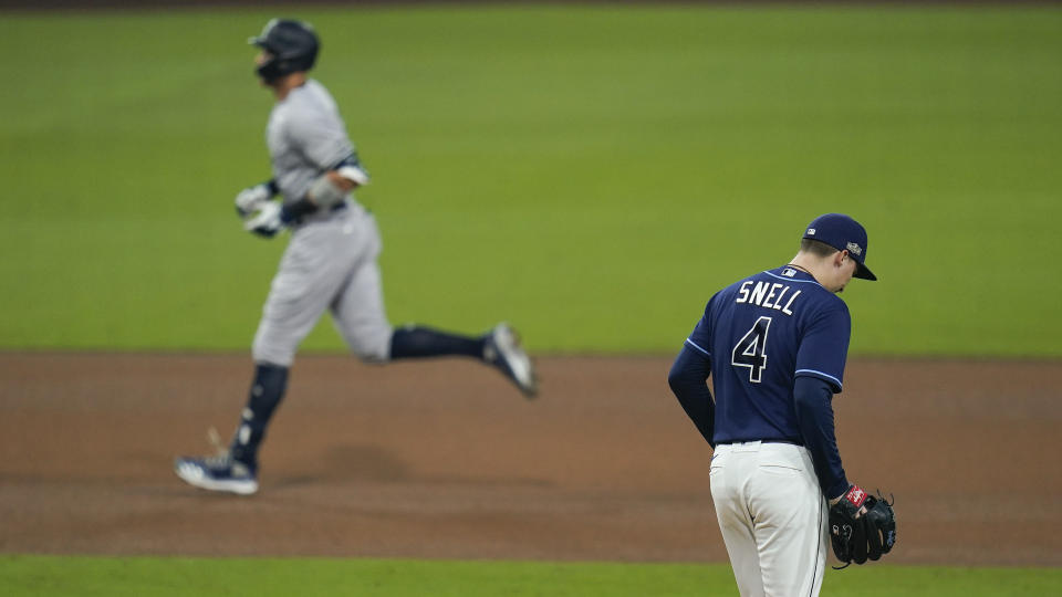 Tampa Bay Rays pitcher Blake Snell (4) reacts after giving up a solo home run to New York Yankees' Aaron Judge during the fifth inning in Game one of a baseball American League Division Series Monday, Oct. 5, 2020, in San Diego. (AP Photo/Gregory Bull)