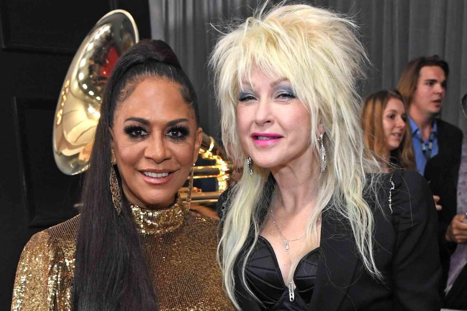 <p>Kevin Mazur/Getty </p> Sheila E. and Cyndi Lauper in Los Angeles in February 2020