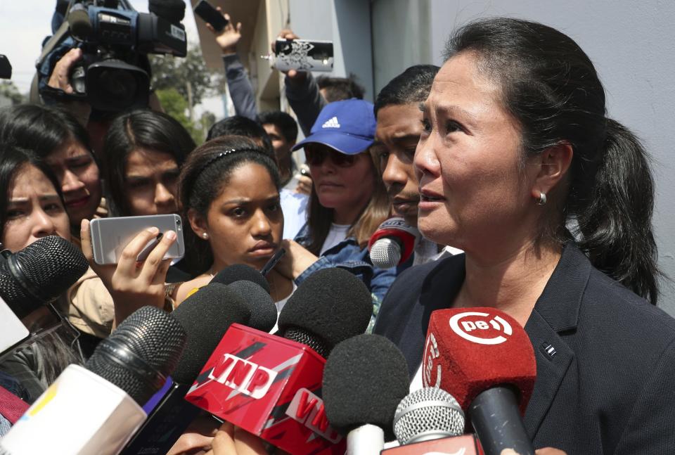 Keiko Fujimori, daughter of Peru’s former President Alberto Fujimori, cries as she speaks with reporters outside of her father’s home in Lima, Peru, Wednesday, Oct. 3, 2018. Peru's Supreme Court has overturned a medical pardon for former President Alberto Fujimori and ordered the strongman be returned to jail to serve out a long sentence for human rights abuses. (AP Photo/Martin Mejia)