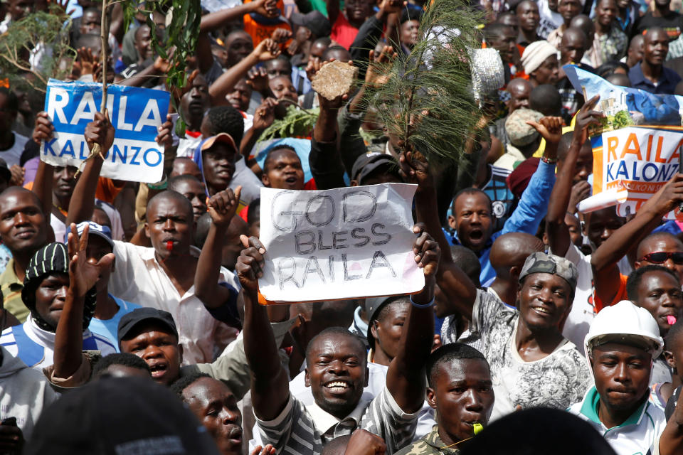 <p>Supporters of opposition leader Raila Odinga attend a mock “swearing-in” ceremony at Uhuru Park in downtown Nairobi, Kenya, Tuesday, Jan. 30, 2018. (Photo: Ben Curtis/AP) </p>